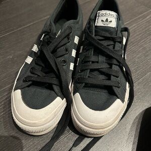 Adidas womens Black Canvas Sneakers with White Stripes